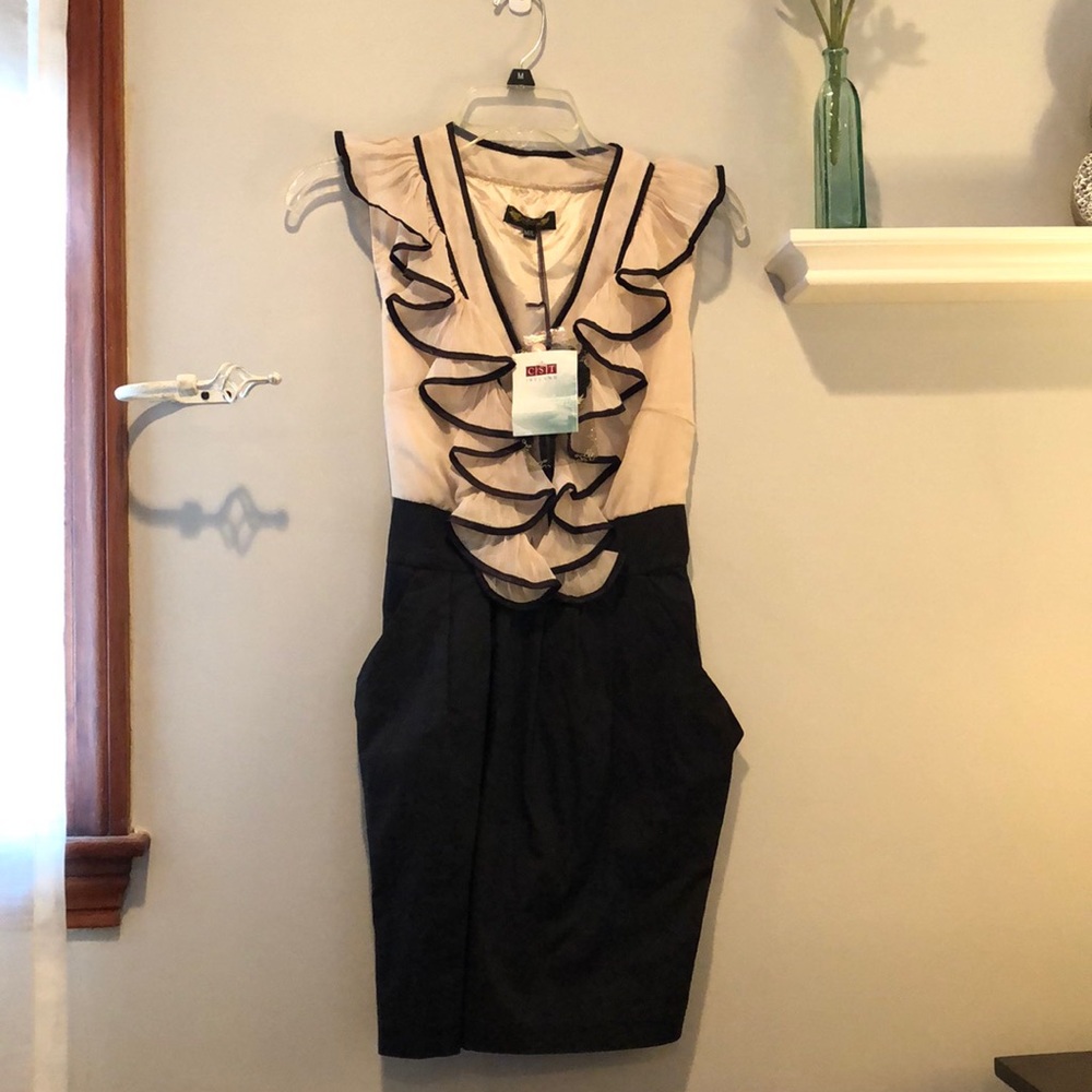 Cute little number! Never worn, bought in Ireland